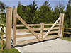 solid teak gate with teak clad support posts